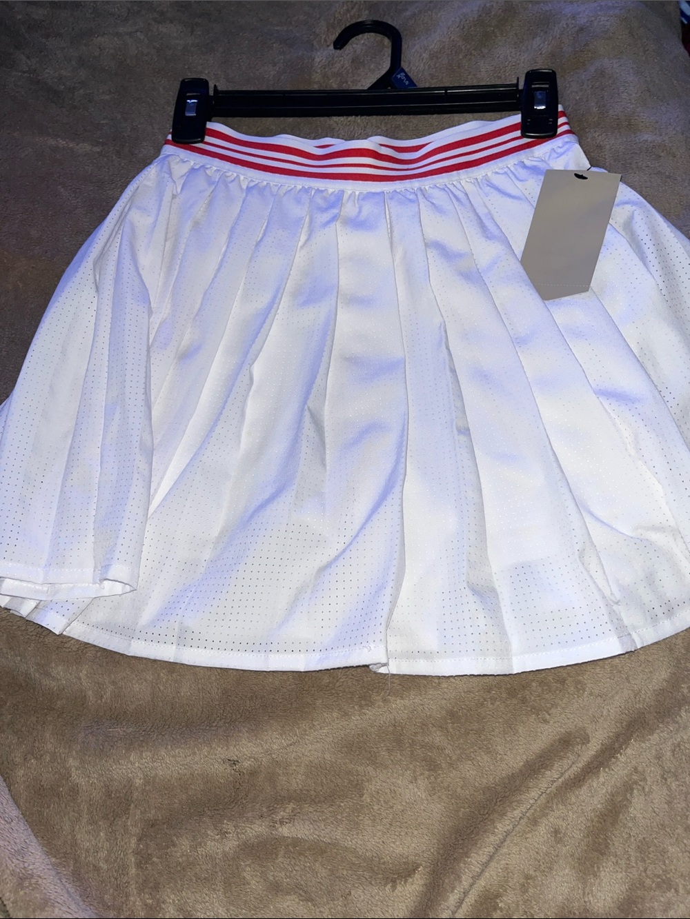 women pleaded Avia skort nwt 0/2